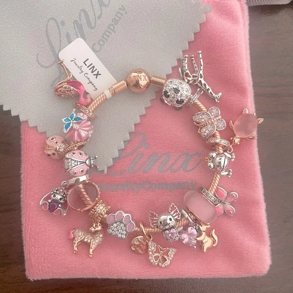 Linx Rose Gold Bracelet with Pink and Rose Gold Animal Themed Charms